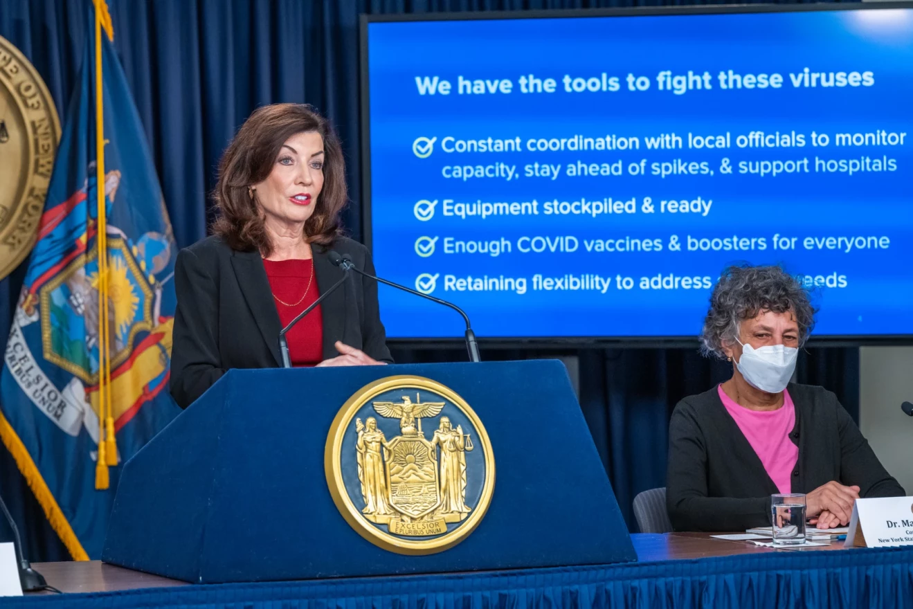 Gov Kathy Hochul gives a briefing on the "tridemic" facing New York on Dec. 7, 2022. Health commissioner Dr. Mary Bassett is at right. (Darren McGee / Office Of Gov. Kathy Hochul)